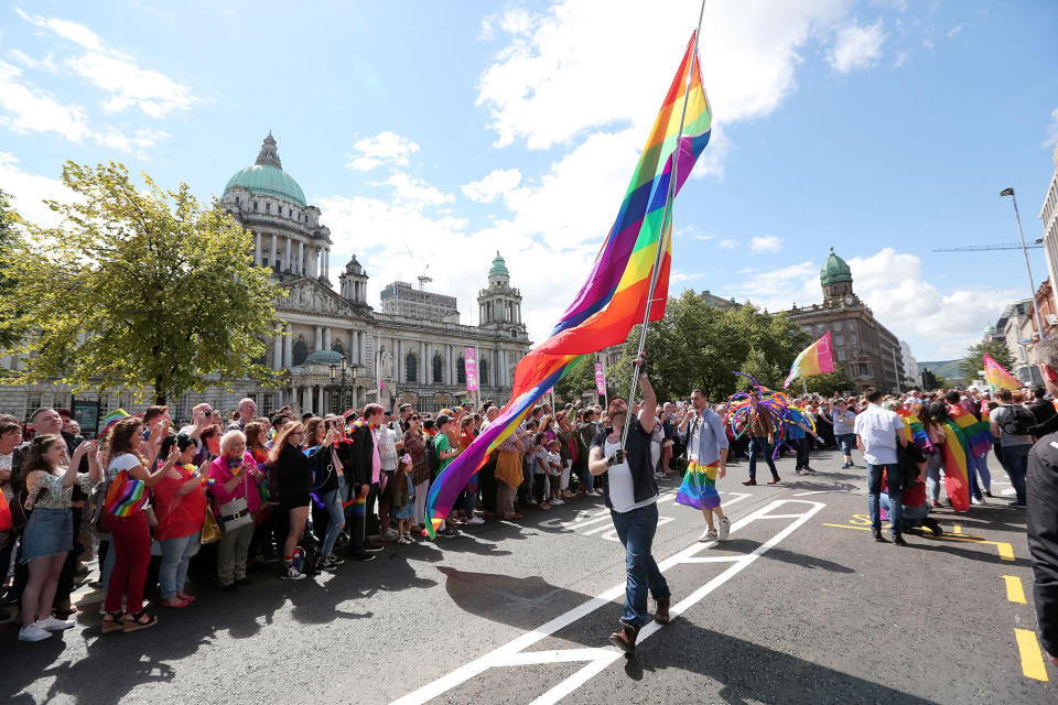 Revelers take part in Belfast Gay Pride parade