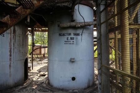 A reactor tank stands among the ruins of the abandoned former Union Carbide pesticide plant in Bhopal November 14, 2014.REUTERS/Danish Siddiqui