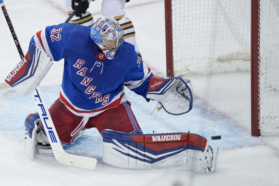 New York Rangers goaltender Jonathan Quick (32) kicks the puck away from the goal during the second period an NHL hockey game against the Boston Bruins, Saturday, Nov. 25, 2023, in New York. (AP Photo/Bryan Woolston)