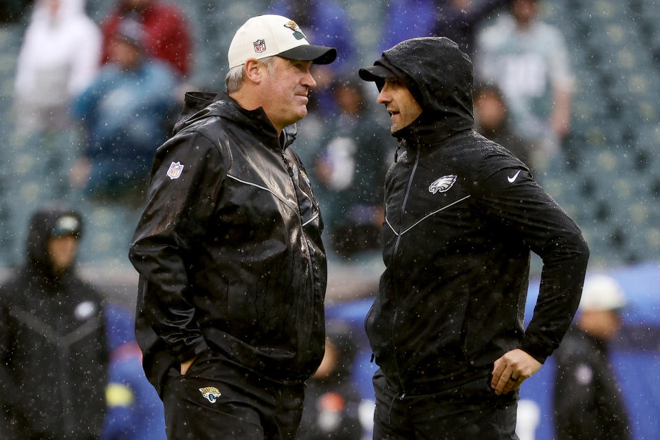 PHILADELPHIA, PENNSYLVANIA - OCTOBER 02: Head coach Doug Pederson of the Jacksonville Jaguars and head coach Nick Sirianni of the Philadelphia Eagles talk during pregame at Lincoln Financial Field on October 02, 2022 in Philadelphia, Pennsylvania. (Photo by Tim Nwachukwu/Getty Images)