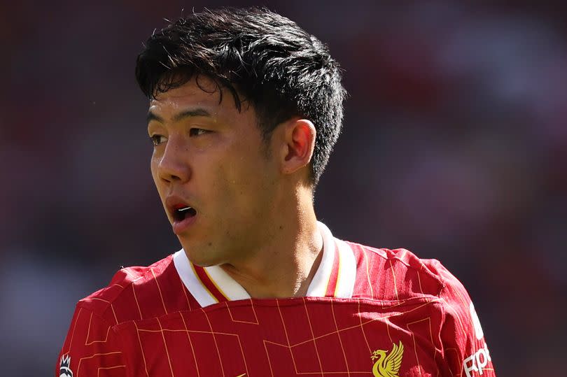 Wataru Endo of Liverpool during the Premier League match against Wolverhampton Wanderers at Anfield on May 19 2024
