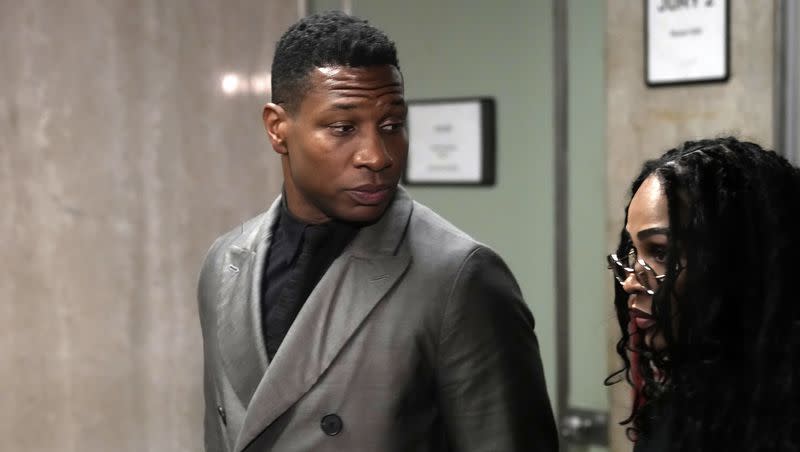 Jonathan Majors leaves a courtroom in New York, Monday, Dec. 18, 2023. Majors was convicted of assaulting his former girlfriend during a confrontation in New York City earlier this year. A Manhattan jury convicted the Marvel star Monday of one misdemeanor assault charge and one harassment violation.