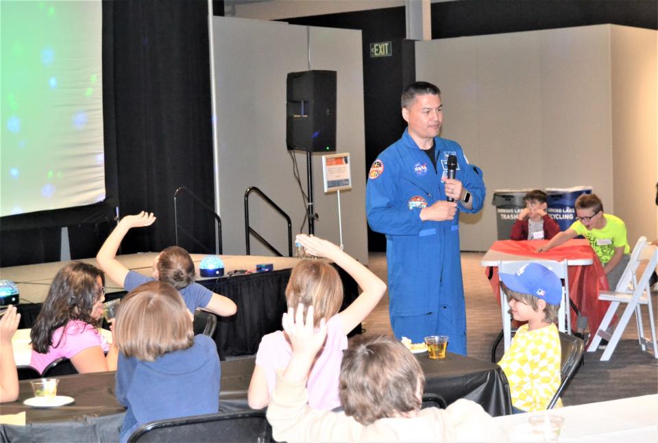 Astronaut Kjell Lindgren answers questions from Putnam Elementary School second-graders on Thursday at the Fort Collins Museum of Discovery in Fort Collins.