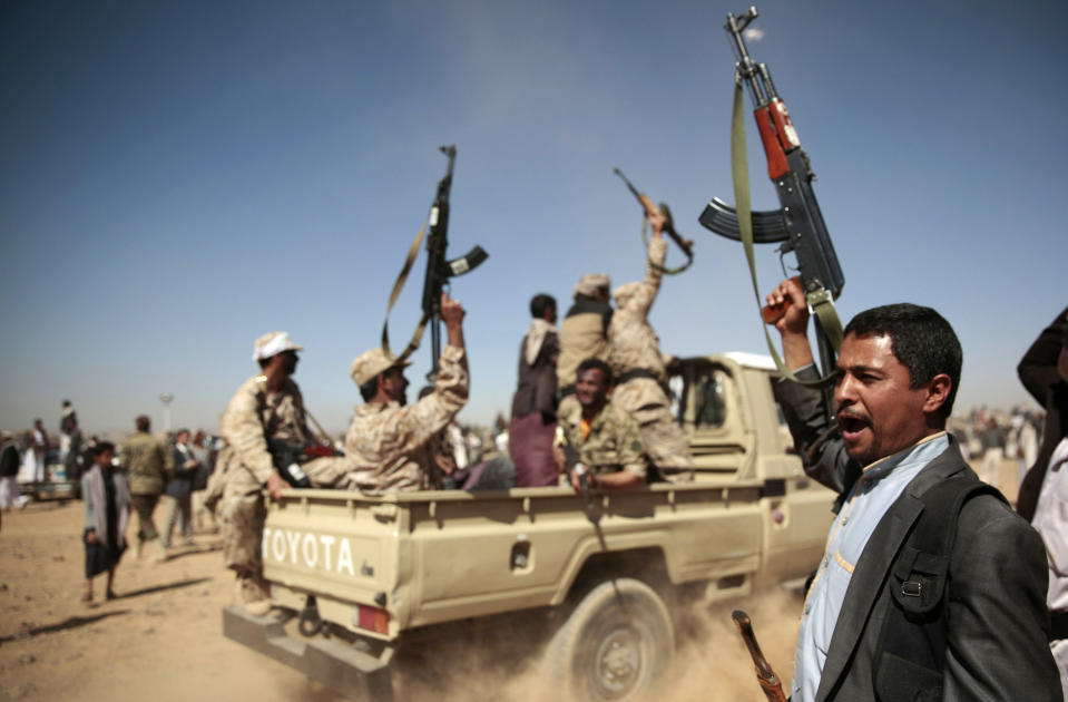 FILE - In this Jan. 3, 2017 file photo, tribesmen loyal to Houthi rebels chant slogans during a gathering aimed at mobilizing more fighters into battlefronts to fight pro-government forces, in Sanaa, Yemen. Moroccan government officials said Thursday Feb. 7, 2019 that Morocco has stopped taking part in military action with the Saudi-led coalition in Yemen’s war, and has recalled its ambassador to Saudi Arabia. (AP Photo/Hani Mohammed, File)