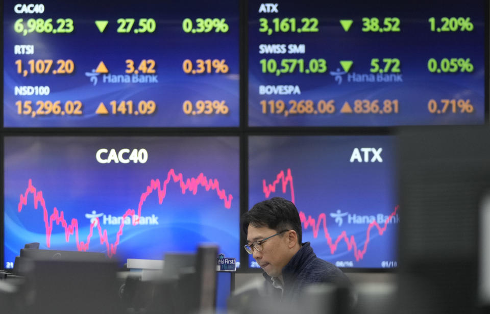 A currency trader watches monitors at the foreign exchange dealing room of the KEB Hana Bank headquarters in Seoul, South Korea, Wednesday, Nov. 8, 2023. Asian shares were mixed in muted trading on Wednesday as attention focused on prospects for improved China-U.S. relations from meetings next week on the sidelines of a Pacific Rim summit. (AP Photo/Ahn Young-joon)