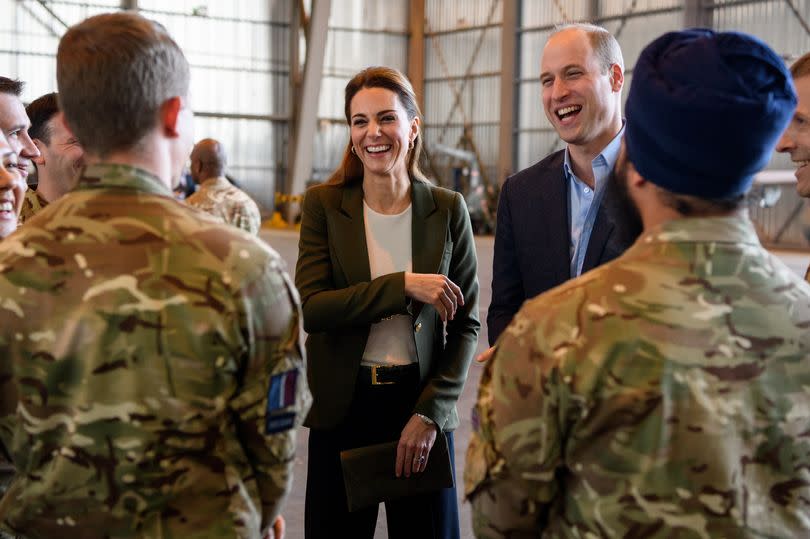 Royal couple share a joke with troops