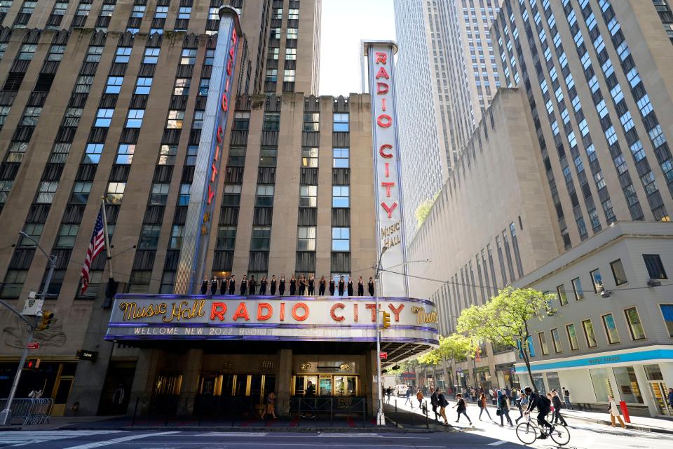 Radio City Music Hall presents eighteen new Rockettes on top of the marquee on Thursday, Oct. 6, 2022, in New York.