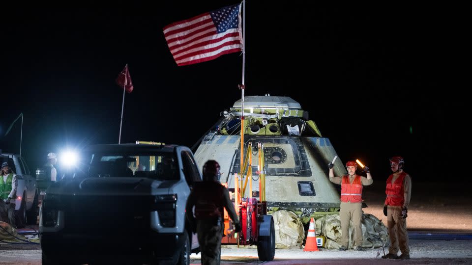 Boeing and NASA teams work around NASA's Boeing Crew Flight Test Starliner spacecraft after it landed uncrewed at White Sands, New Mexico, on September 7. - Aubrey Gemignani/NASA