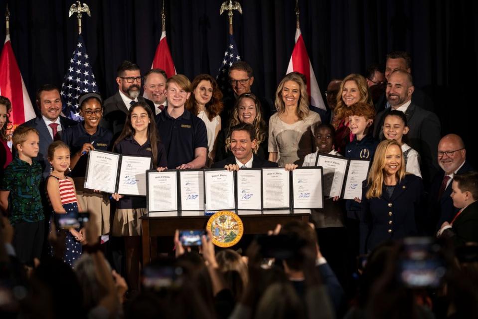 Florida Gov. Ron DeSantis signs a series of education bills at Cambridge Christian school in Tampa, Fla. on May 17, 2023.<span class="copyright">Thomas Simonetti—The Washington Post/Getty Images</span>