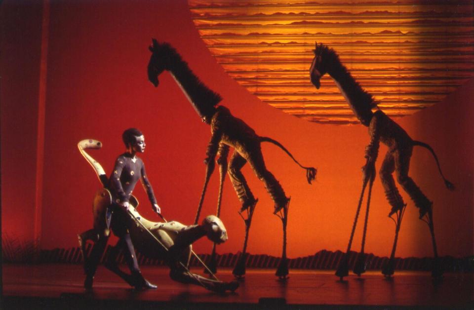 Performers portray a cheetah and a pair of giraffes in Disney's beloved musical "The Lion King."