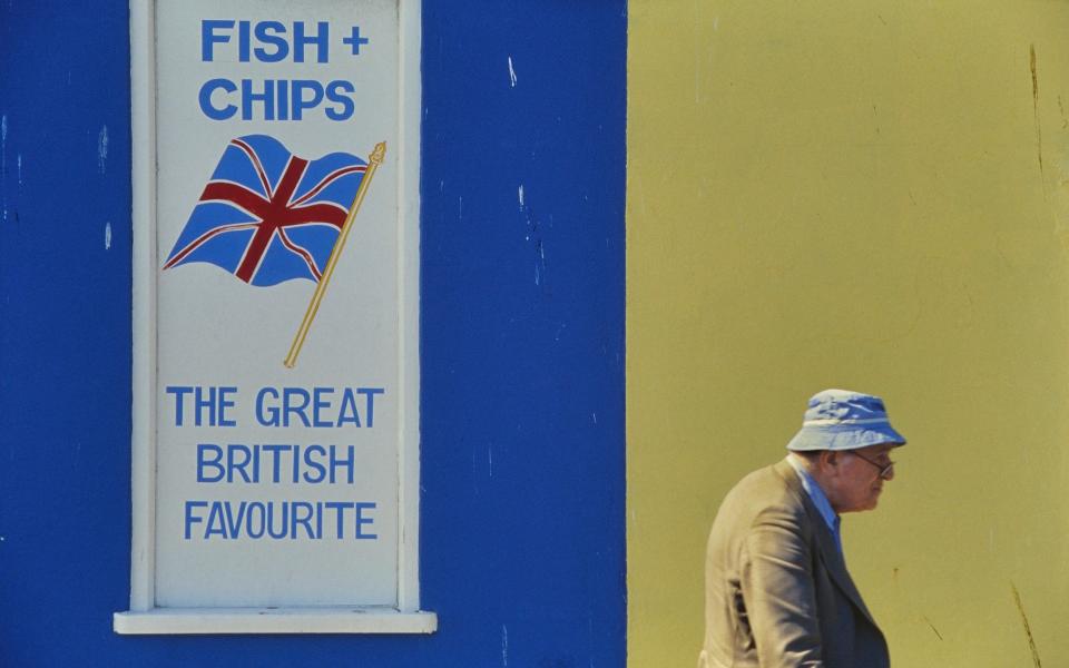 The national dish: a patriotic sign in the coastal town of Hastings, East Sussex - alamy