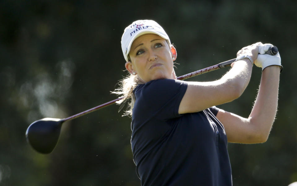 Cristie Kerr watches her tee shot on the 16th hole during the first round at the LPGA Kraft Nabisco Championship golf tournament Thursday, April 3, 2014 in Rancho Mirage, Calif. (AP Photo/Chris Carlson)