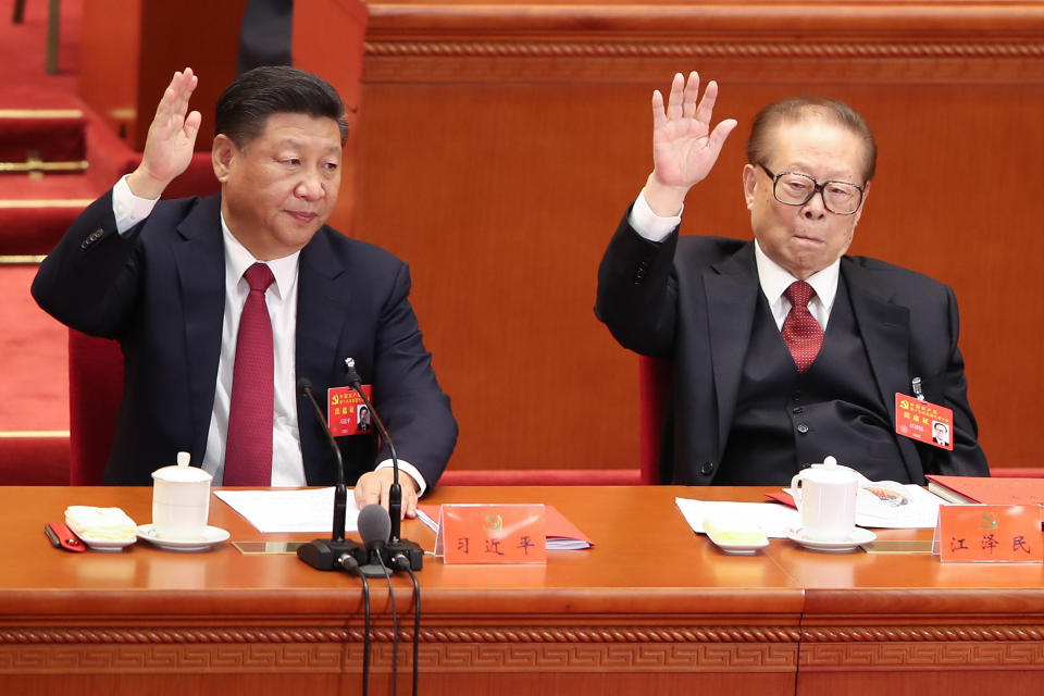 BEIJING, CHINA - OCTOBER 24:  Chinese President Xi Jinping (L) with China's former president Jiang Zemin (R) vote at the closing of the 19th Communist Party Congress at the Great Hall of the People on October 24, 2017 in Beijing, China. The 19th CPC National Congress is going to run 7 days and a new central committee of CPC will be produced.  (Photo by Lintao Zhang/Getty Images)