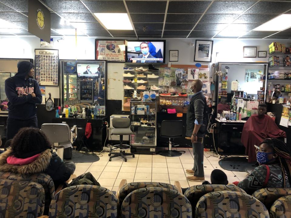 Minnesotans watch TVs as verdict is read.