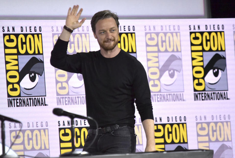 James McAvoy waves to the audience as he walks on stage at the "His Dark Materials" panel on day one of Comic-Con International on Thursday, July 18, 2019, in San Diego. (Photo by Richard Shotwell/Invision/AP)