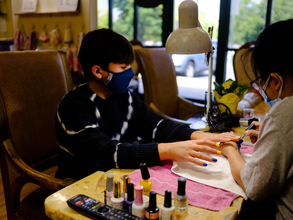 Eli, 12, gets their nails done in Mooresville, N.C.<span class="copyright">Annie Flanagan</span>