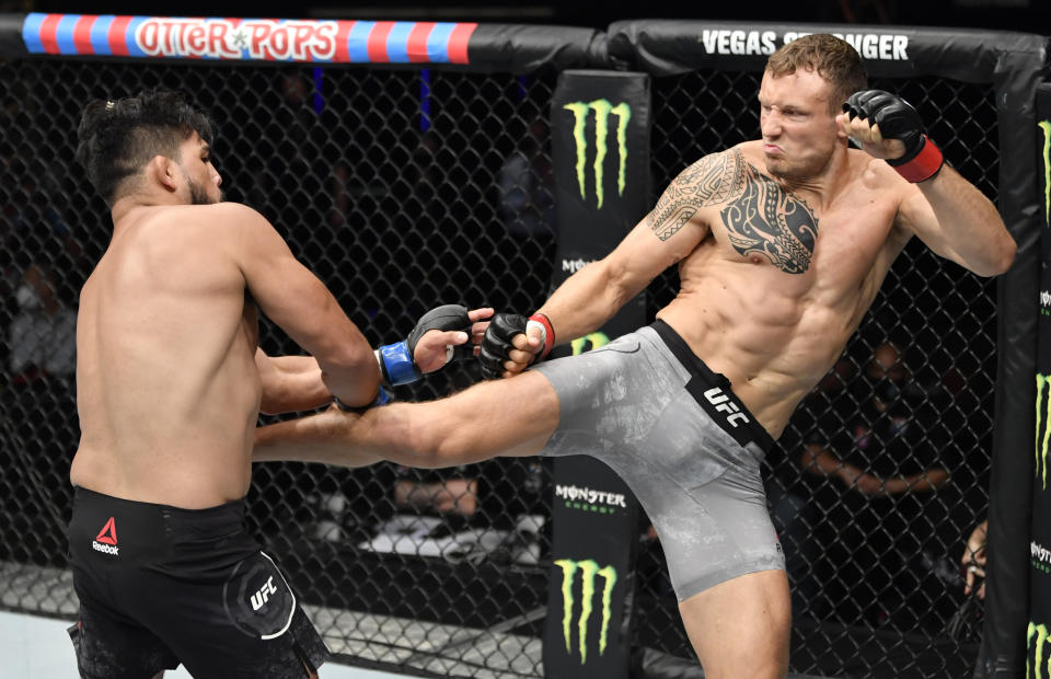 ABU DHABI, UNITED ARAB EMIRATES - JULY 19: (R-L) Jack Hermansson of Sweden kicks Kelvin Gastelum in their middleweight bout during the UFC Fight Night event inside Flash Forum on UFC Fight Island on July 19, 2020 in Yas Island, Abu Dhabi, United Arab Emirates. (Photo by Jeff Bottari/Zuffa LLC via Getty Images)