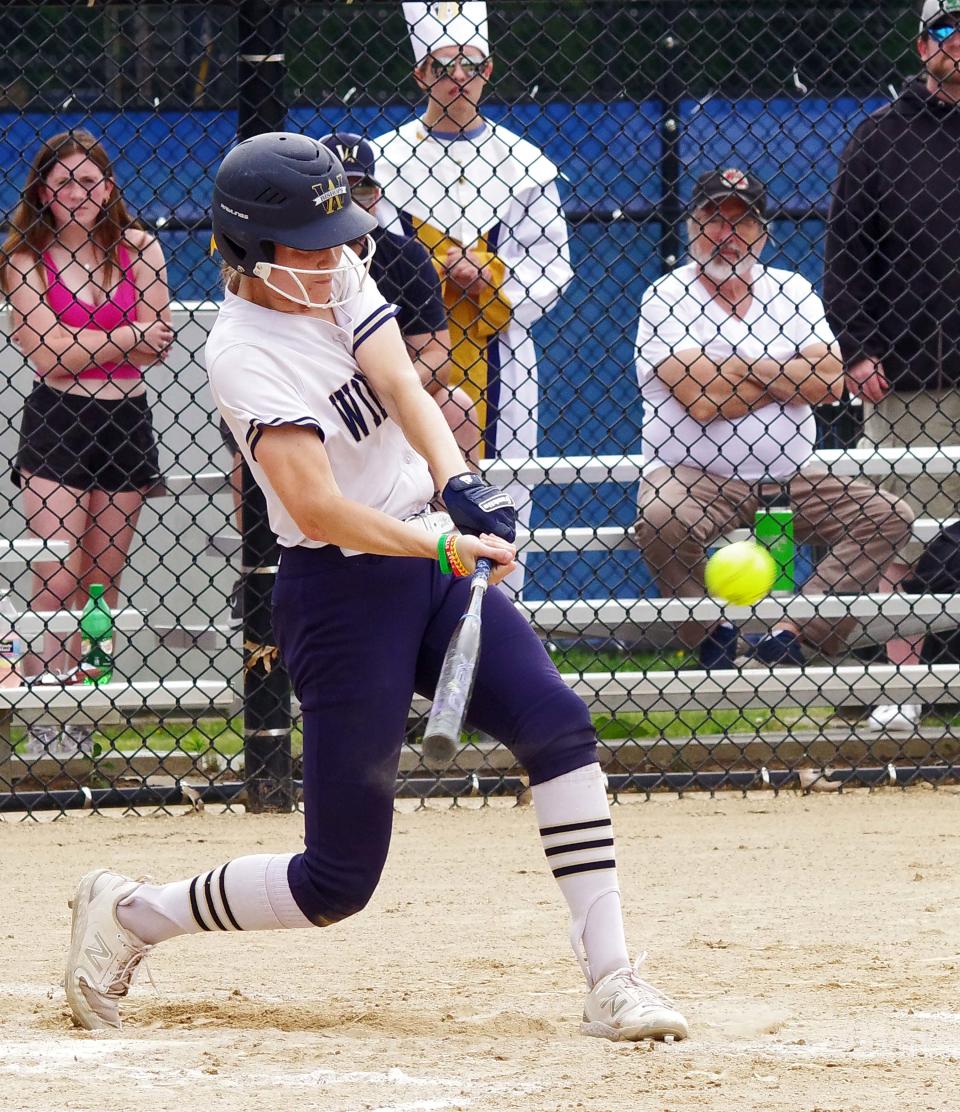 Jessica Keefe of Archbishop Williams makes hard contact during a game against Case on Wednesday, June 14, 2023.
