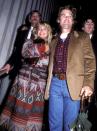 <p>Goldie Hawn and Kurt Russell brought folksy fall vibes to the grand opening of a new FAO Schwarz location. The plaid, denim, tribal-printed long coat, and beige suit jacket could all totally be found in a hipster, vintage shop this autumn.</p>