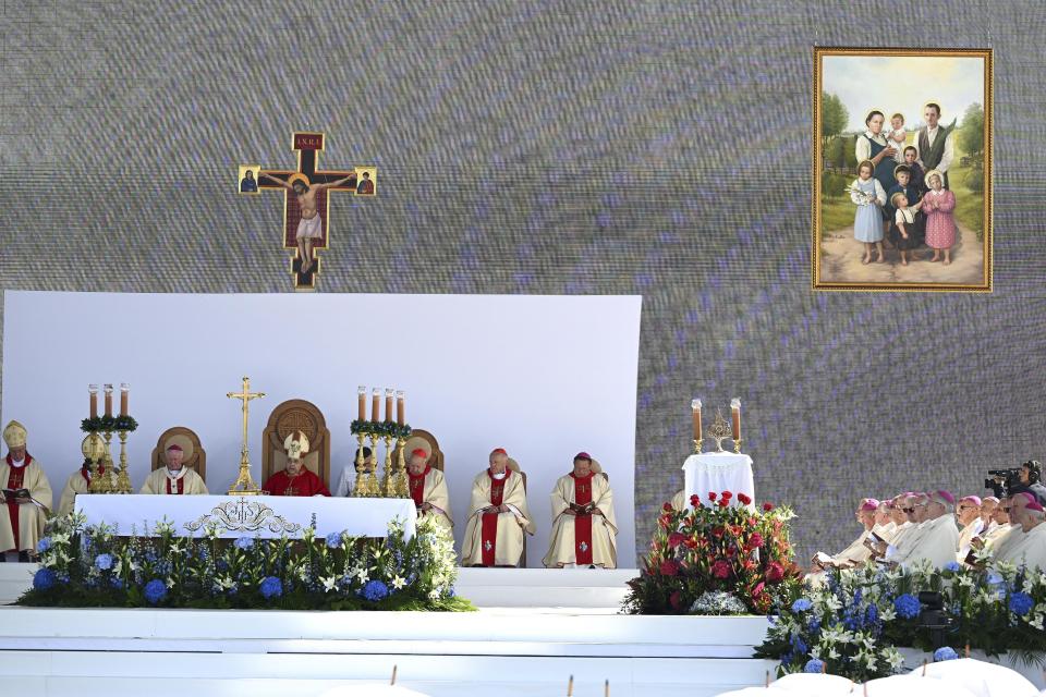 Crowd attending a Mass in which the Vatican beatified the Polish Ulma family, including small children, who were killed by the Nazis in 1944 for having sheltered Jews, in the Ulmas' home village of Markowa Poland, on Sunday, Sept. 10, 2023. The Vatican beatified also the Ulmas' unborn child, saying it was born during the killings and was baptized in the martyred mother's blood. (AP Photo)