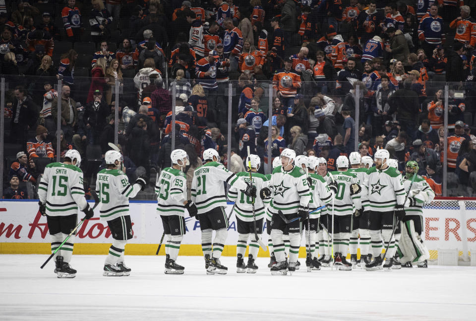 Dallas Stars celebrate a win over the Edmonton Oilers in an NHL hockey game Thursday, Nov. 2, 2023, in Edmonton, Alberta. (Jason Franson/The Canadian Press via AP)