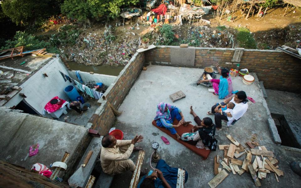 Waste seen around people's homes in Islamabad - Hazel Thompson/Tearfund