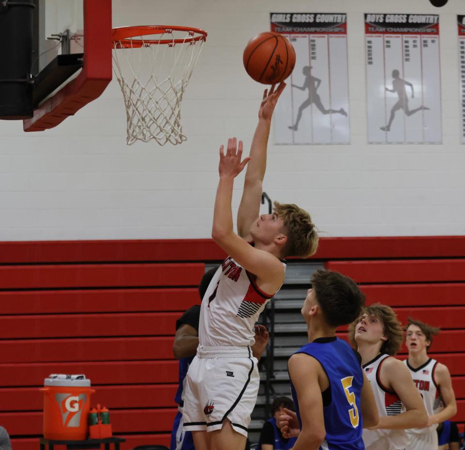 Clinton's Eli Turner goes up for a shot during Tuesday's game against Madison.