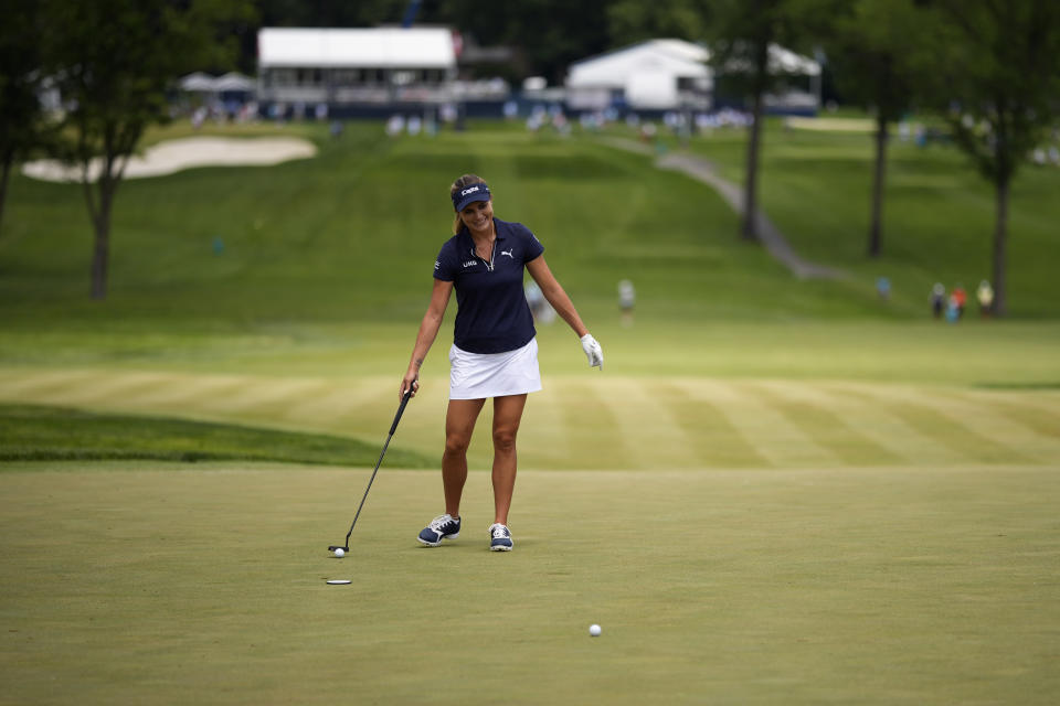 Lexi Thompson smiles while putting on the 18th green during a practice round for the U.S. Women's Open golf tournament at Lancaster Country Club, Tuesday, May 28, 2024, in Lancaster, Pa. (AP Photo/Matt Slocum)