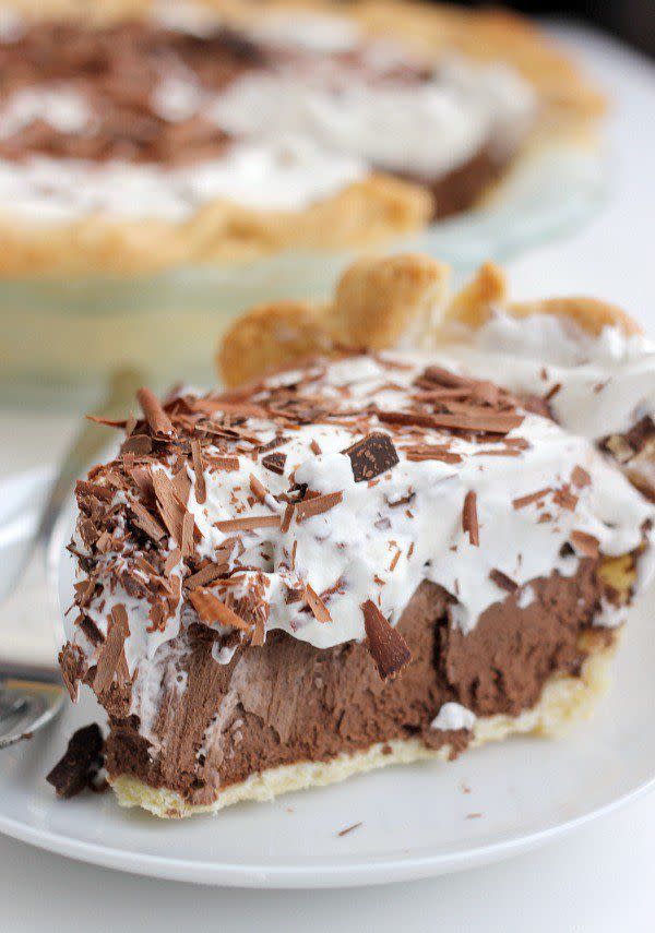 <p>Top off this pie with chocolate shavings for a fun decorative look. </p><p><strong>Get the recipe at <a rel="nofollow noopener" href="http://bakerbettie.com/chocolate-french-silk-pie/" target="_blank" data-ylk="slk:Baker Bettie;elm:context_link;itc:0;sec:content-canvas" class="link ">Baker Bettie</a>. </strong></p>