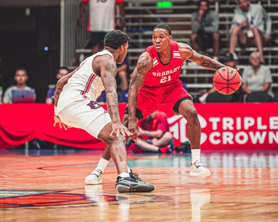 Bradley point guard Duke Deen works against Auburn guard Wendell Green Jr. during BU's 85-64 loss in the 2022 Cancun Challenge on Tuesday, Nov. 22, 2022 at Hard Rock Hotel Riviera Maya in Cancun, Mexico.