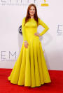 <b>FLOP : La robe jaune par Julianne Moore </b><br> L'actrice a elle aussi osé la robe jaune, mais la coupe est beaucoup plus spéciale... On regrette que cette création Christian Dior soit aussi couvrante et qu'elle soit si lourde sur le bas. Néanmoins, Julianne Moore garde la classe malgré cette tenue étrange.