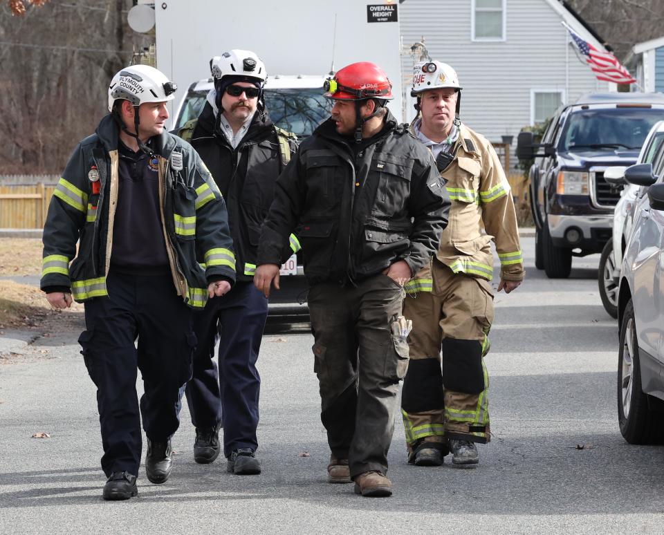 First responders at the scene of a partial foundation collapse at a home located at 50 Dwight Street in Hanson on Wednesday, Feb. 7, 2024.