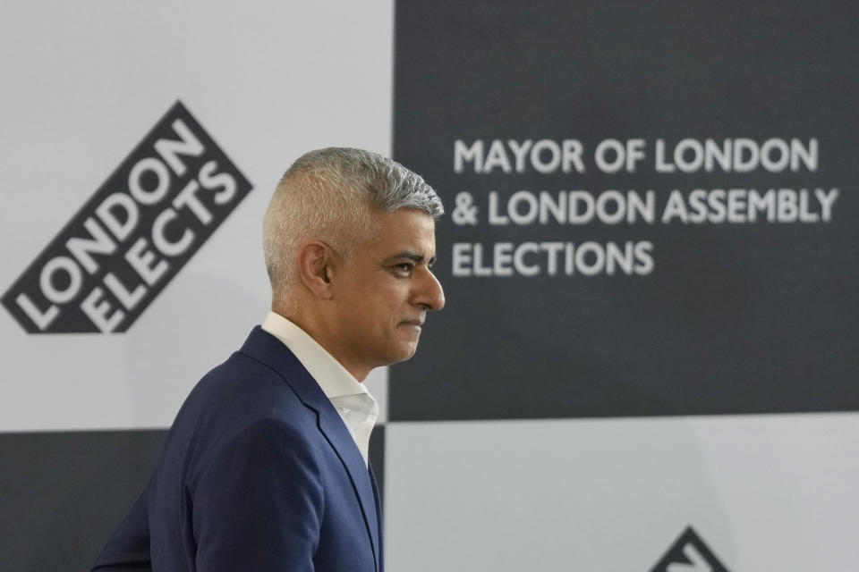 Sadiq Khan walks on to the stage as he is re-elected for a record third time as Mayor of London, following the counting of votes, at City Hall in London, Saturday, May 4, 2024. Khan, the Labour Party's Mayor of London, has romped to victory, securing a record third straight term at City Hall, on another hugely disappointing day for the U.K.'s governing Conservatives ahead of a looming general election. (AP Photo/Alastair Grant)