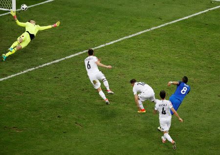 France's Dimitri Payet scores their second goal against Albania. REUTERS/Jean-Paul Pelissier Livepic