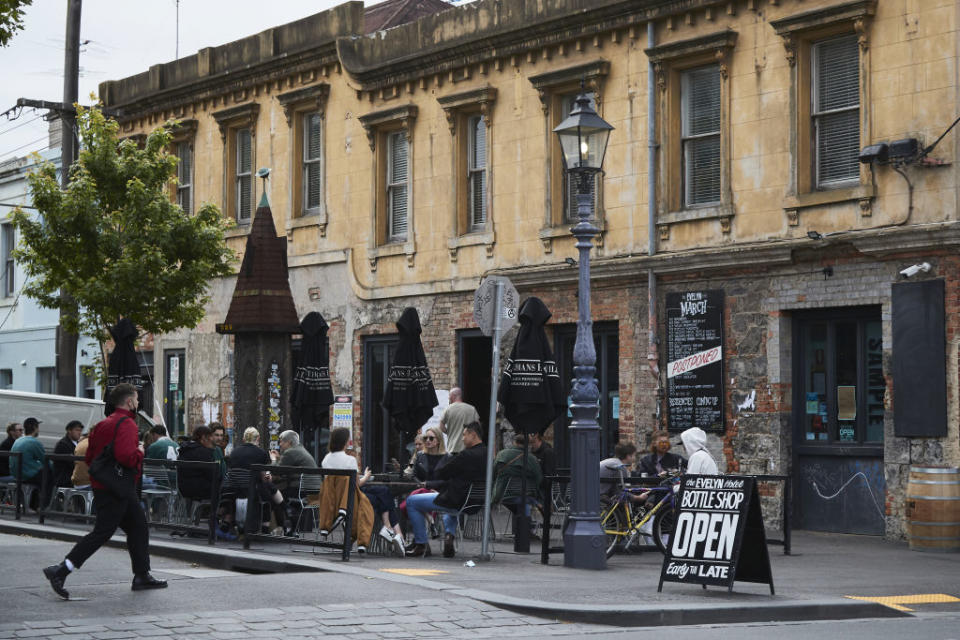 Customers sit outside the Evelyn pub in Melbourne as debate rages over the nickname for parmigiana. 