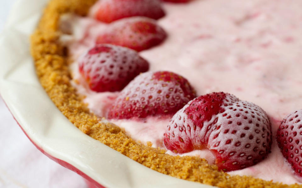 <p>Ashley English</p><p>This simple five-ingredient pie is the perfect dessert on a sunny day.</p><p><strong>Get the recipe:<a href="https://parade.com/26962/ashleyenglish/frozen-strawberry-pie/" rel="nofollow noopener" target="_blank" data-ylk="slk:Frozen Strawberry Pie;elm:context_link;itc:0;sec:content-canvas" class="link "> Frozen Strawberry Pie</a></strong></p>