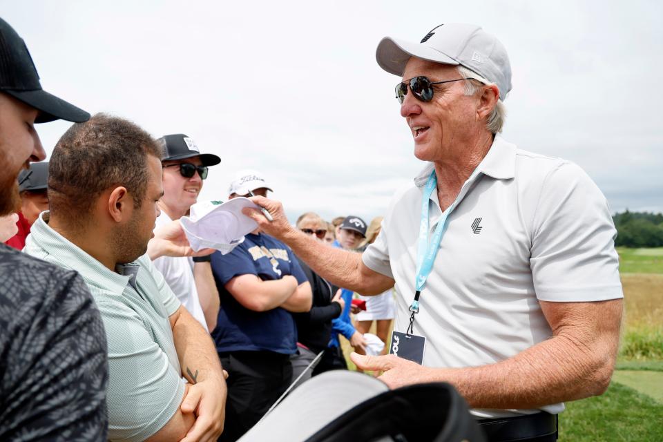 Jul 2, 2022; Portland, Oregon, USA; Greg Norman, CEO and commissioner of LIV Golf signs autographs for fans during the final round of the LIV Golf tournament at Pumpkin Ridge Golf Club. Mandatory Credit: Soobum Im-USA TODAY Sports