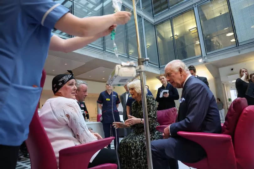 King Charles III, patron of Cancer Research UK and Macmillan Cancer Support, and Queen Camilla meet with Lesley Woodbridge