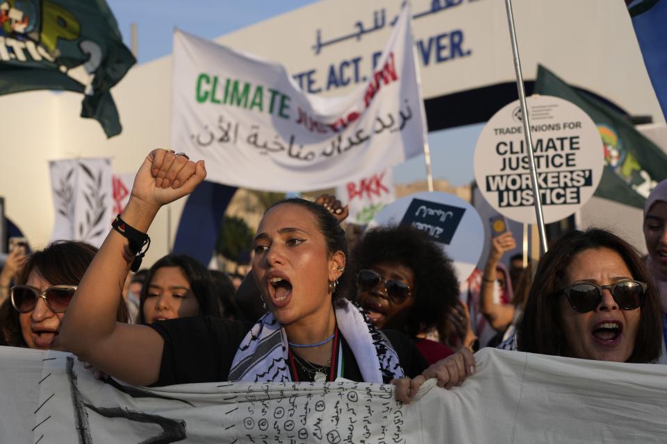 Activist Rahma Zein participates in a demonstration for climate justice and a ceasefire in the Israel-Hamas war at the COP28 U.N. Climate Summit, Saturday, Dec. 9, 2023, in Dubai, United Arab Emirates. (AP Photo/Rafiq Maqbool)