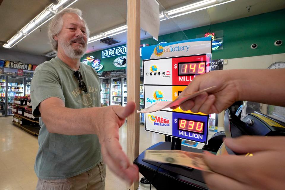 Buying lottery tickets in Sacramento, Calif., on July 26, 2022.