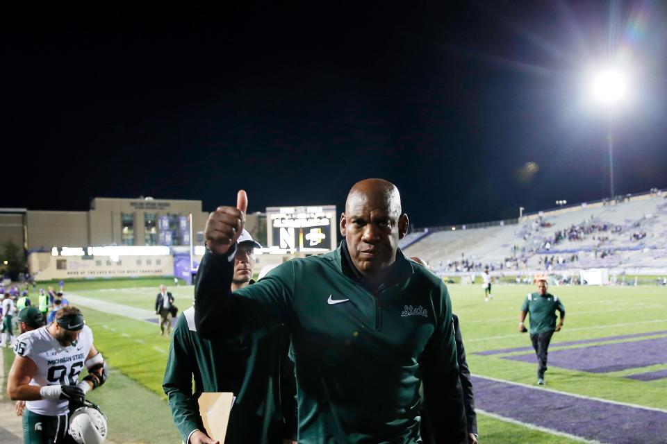 Michigan State coach Mel Tucker gives a thumbs up to fans as he walks off the field after defeating Northwestern at Ryan Field, 38-21, on Friday Sept. 3, 2021 in Evanston, Illinois.