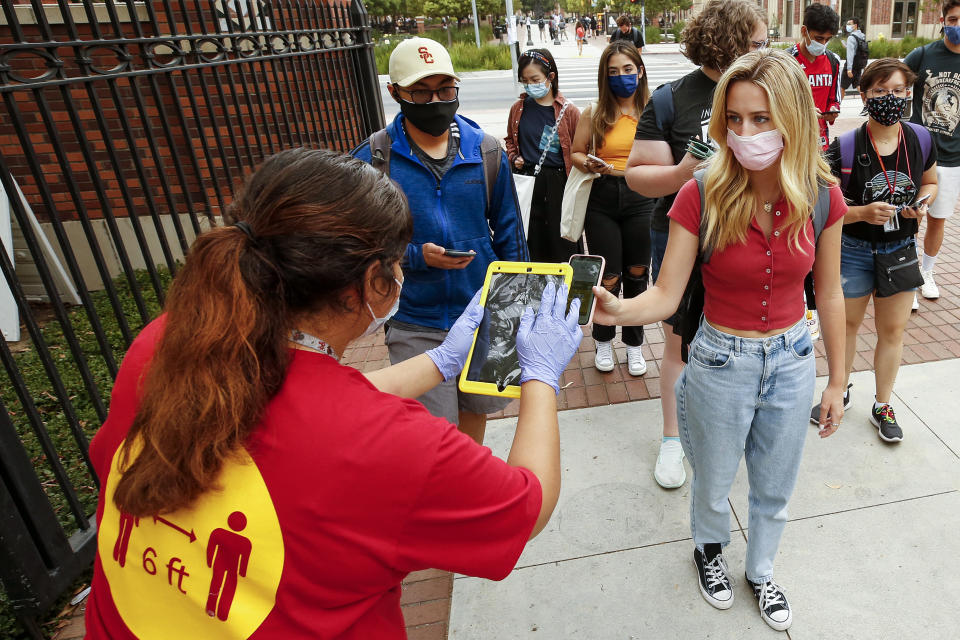 A University of Southern California student in Los Angeles displays a 