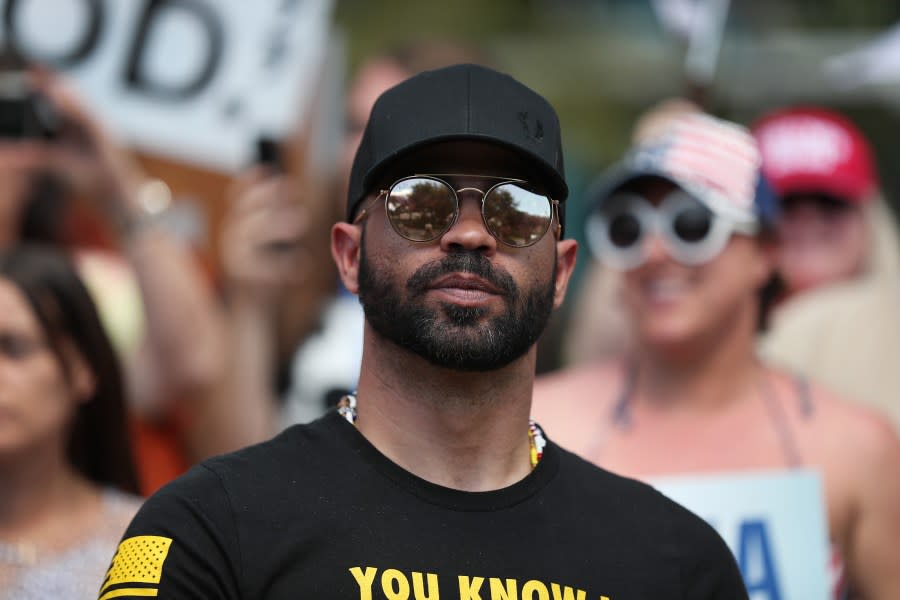 ORLANDO, FLORIDA – FEBRUARY 27: Enrique Tarrio, leader of the Proud Boys, stands outside of the Hyatt Regency where the Conservative Political Action Conference is being held on February 27, 2021 in Orlando, Florida. Begun in 1974, CPAC brings together conservative organizations, activists, and world leaders to discuss issues important to them. (Photo by Joe Raedle/Getty Images)