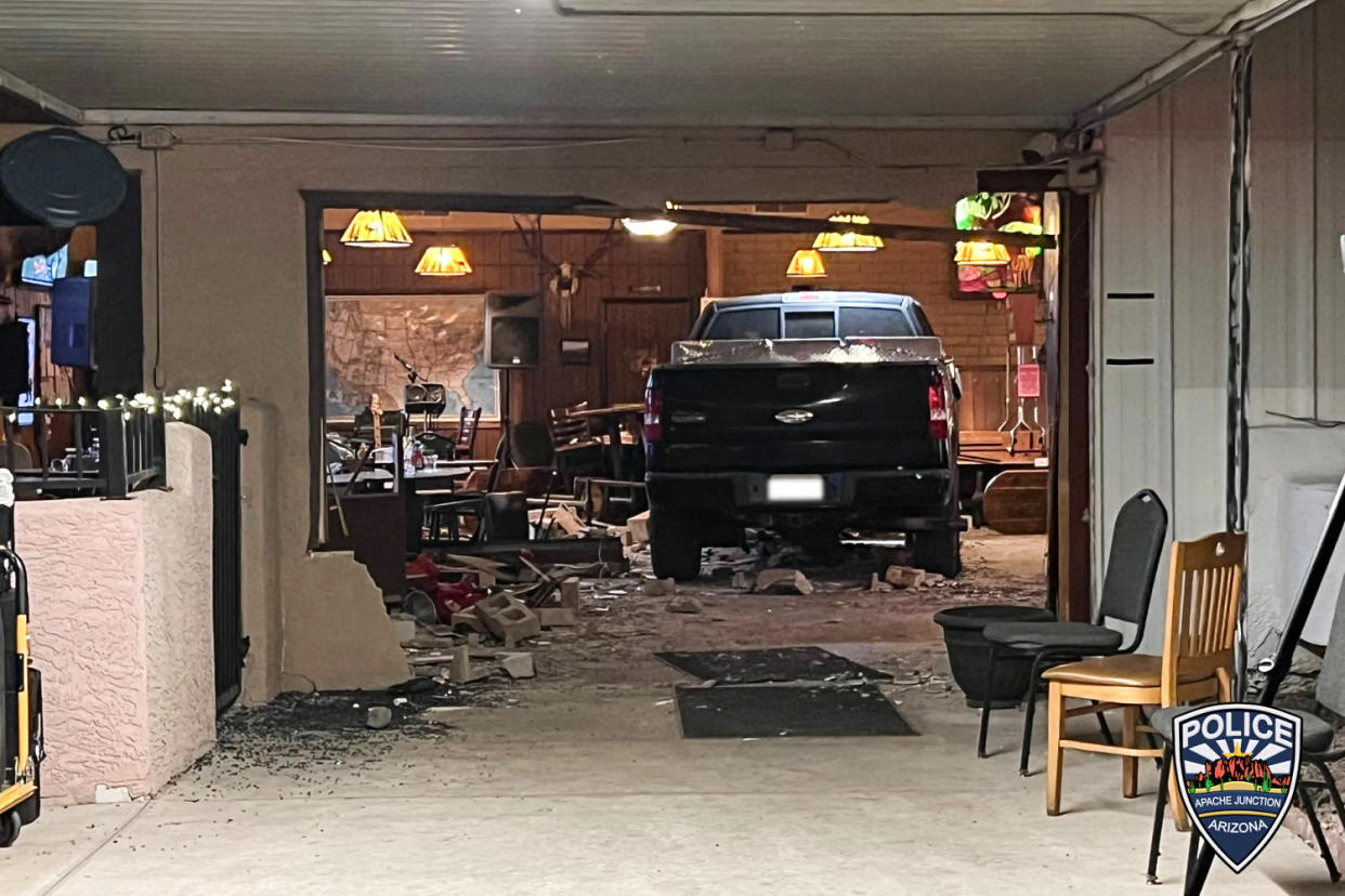 The scene of a truck inside of the Elks Lodge, surrounded by debris and damage (Apache Junction Arizona)