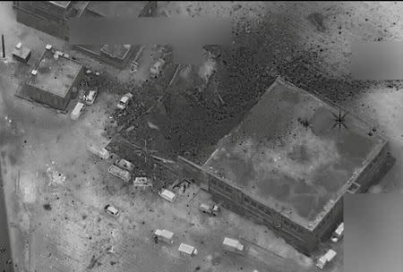 A post-strike photo of the site which the Pentagon says is of an al Qaeda meeting in al-Jinah, Syria, that the U.S. struck on March 16. Courtesy U.S. Navy/Handout via REUTERS