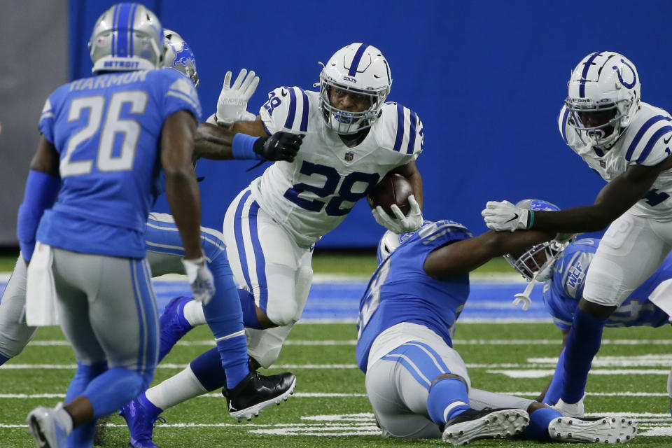 Indianapolis Colts running back Jonathan Taylor (28) rushes during the first half of an NFL football game against the Detroit Lions, Sunday, Nov. 1, 2020, in Detroit. (AP Photo/Duane Burleson)