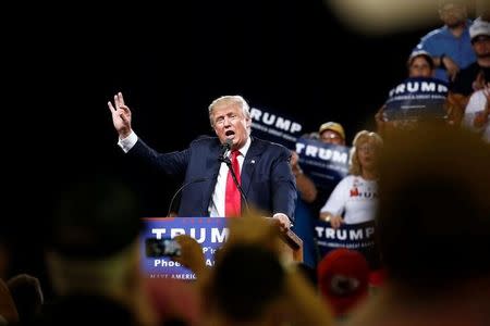 Republican U.S. Presidential candidate Donald Trump speaks at a campaign rally in Phoenix, Arizona, June 18, 2016. REUTERS/Nancy Wiechec