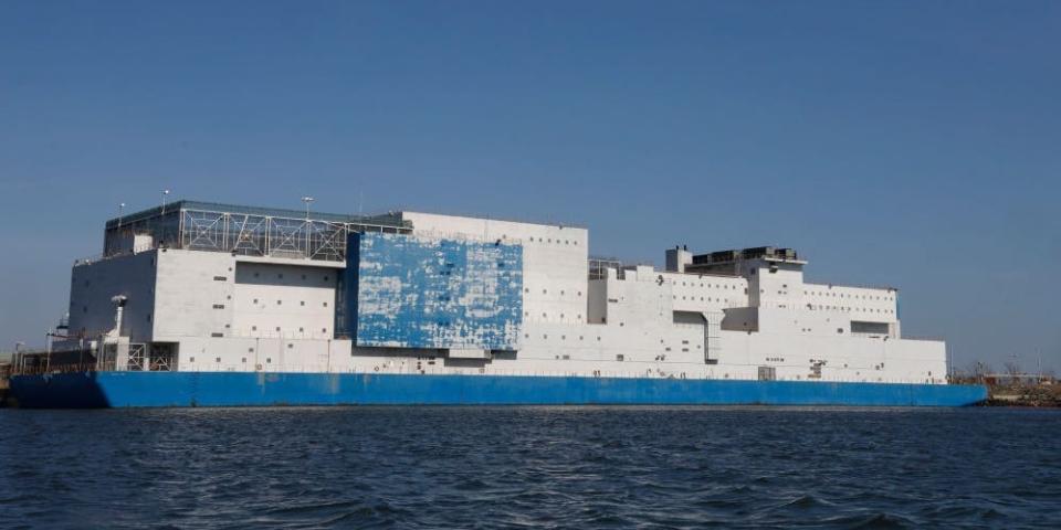 A photo of Vernon C. Bain floating on the East River in New York.