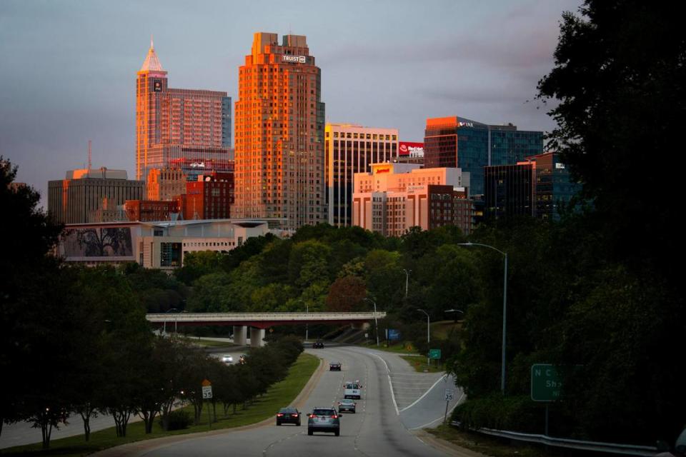 The last minutes of sunset illuminate the growing downtown Raleigh skyline, Oct. 2, 2022.