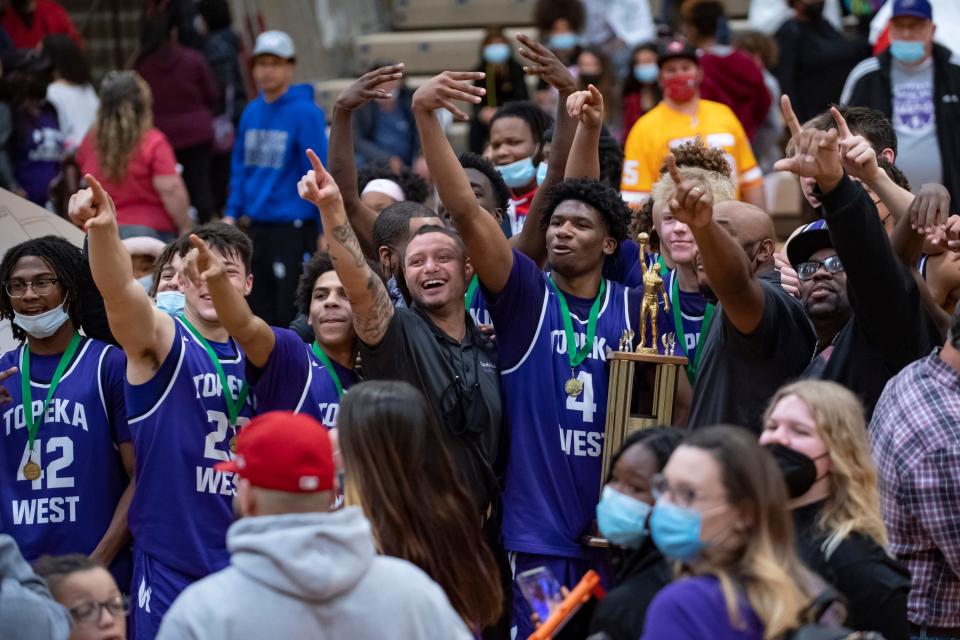 Topeka West players and fans celebrate the team's title win Saturday.